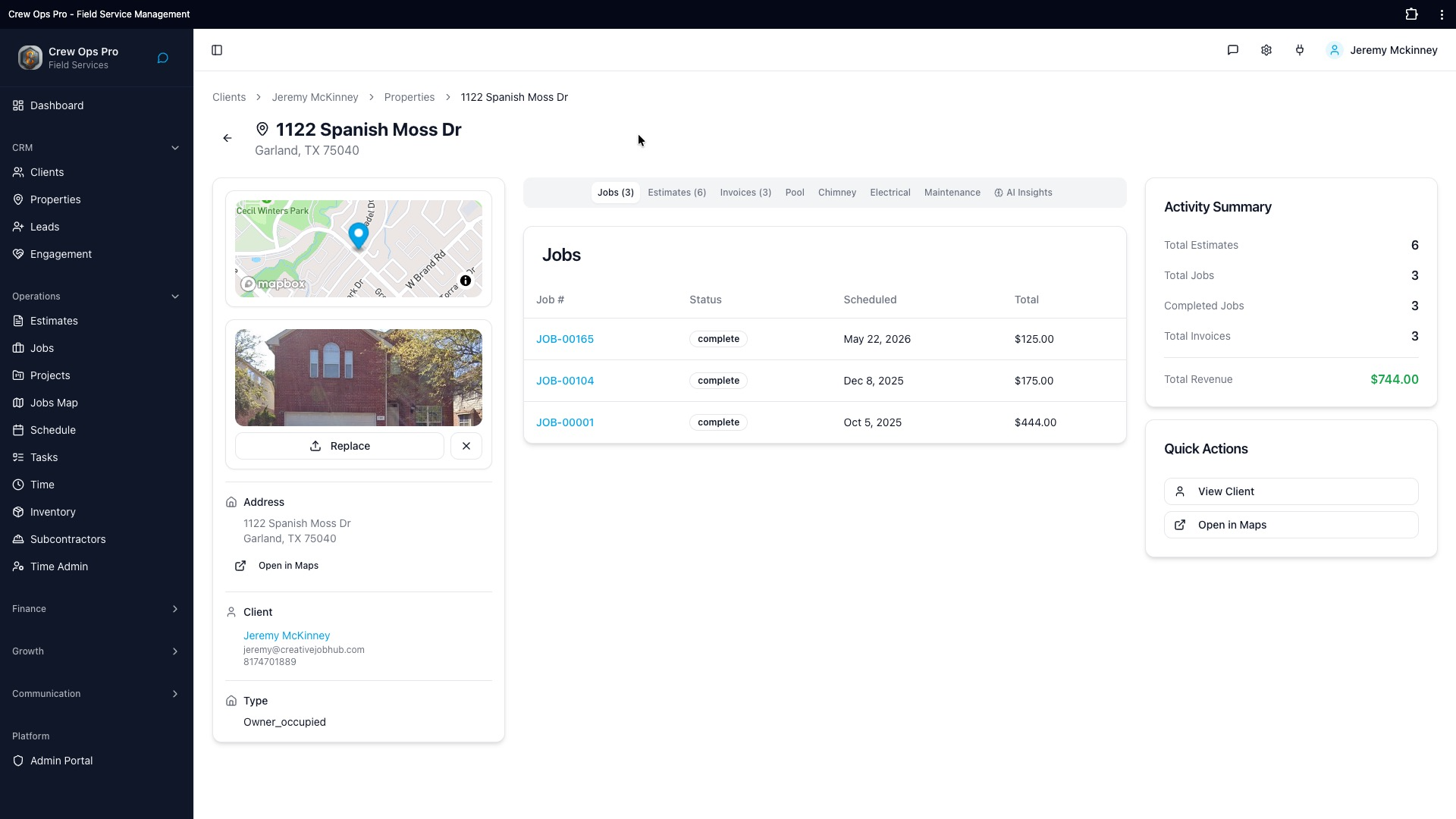 CrewOpsPro property profile dashboard showing jobs, estimates, invoices, and activity summary for a single address